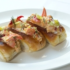 Posh lobster in not-so-posh hot dog buns