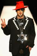 Boy George charged with false imprisonment
