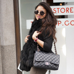 Anastasia: My bag? It's classic, it's convenient. Pure Chanel.