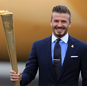 Beckham Olympics on David Beckham Looks Mighty Fine Holding The London Olympic Flame