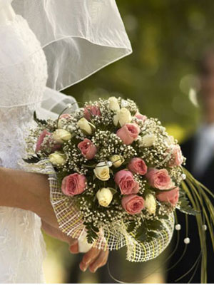 bride carrying bouquet