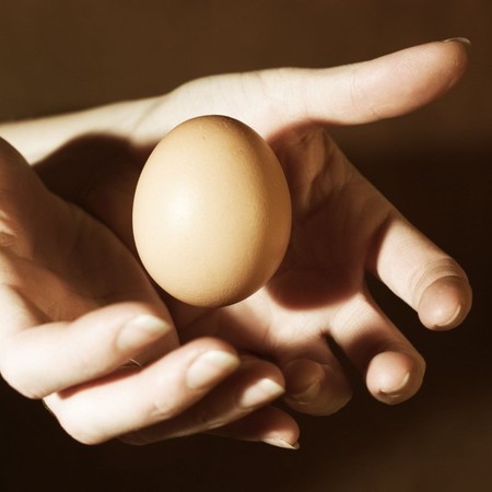 woman throwing an egg