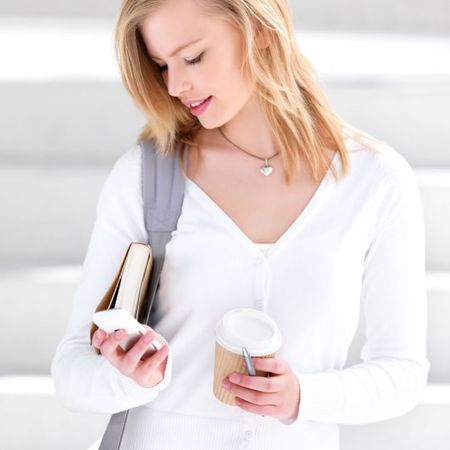 woman walking with mobile phone