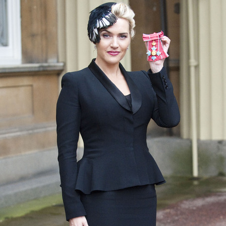 Kate Winslet in Alexander McQueen collecting CBE for services to theatre and drama