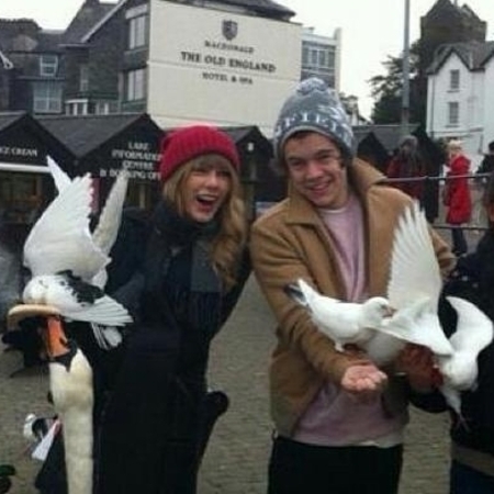 Harry Styles and Taylor Swift with doves