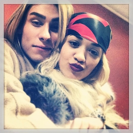 Rita Ora rocks a bold plum pout