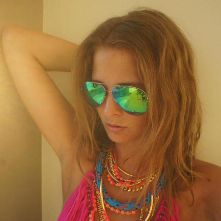 Millie Mackintosh shows off tousled beach hair