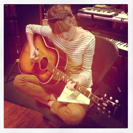 Taylor Swift does striped studio style
