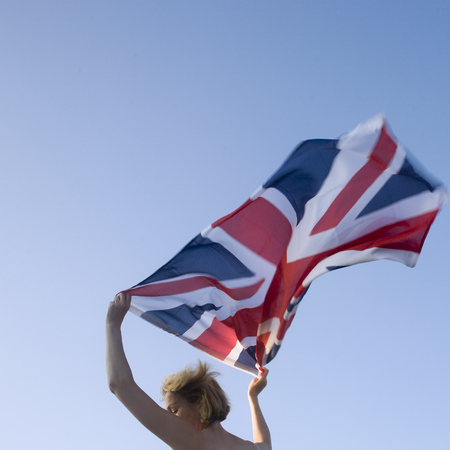 Woman waving union jack
