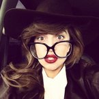Lady Gaga teams geek chic with statement lips