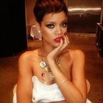Rihanna shows off short new hairstyle in hot red