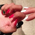 Kim Kardashian does long white nails