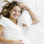 Pregnant woman in bed