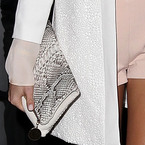 MILLIE MACKINTOSH CARRIES ASPINAL'S MILLIE CLUTCH