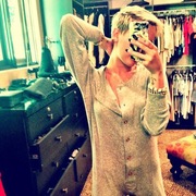 Miley Cyrus shows off Chanel onesie on Twitter