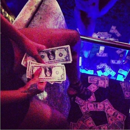 Rihanna makes it rain