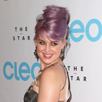 Kelly Osbourne works wispy purple beehive for CLEO bash