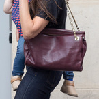 CELEB BAGS: Victoria Beckham's aubergine bag