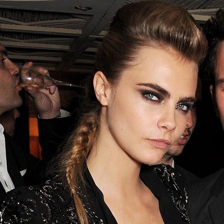 Cara Delevingne shows off her tattoo in Cannes with Jeremy Irvine