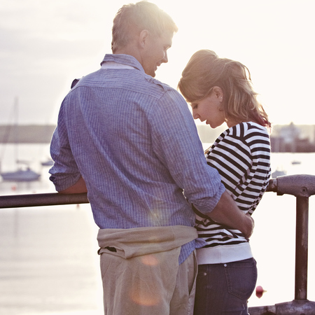 Couple hugging outdoors