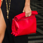Rihanna with red Celine handbag and River Island maxi dress