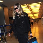 Pregnant Fergie lands at JFK