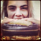 Cara Delevingne eats a Hogan handbag burger