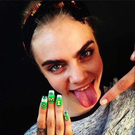 Cara Delevingne celebrates 2 million followers with nail art