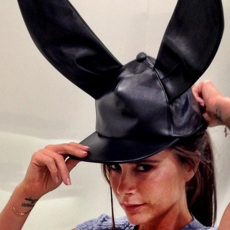 Victoria Beckham shows of Comme de Garçons hat
