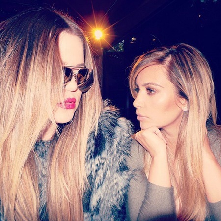 Kim Kardashian - Khloe Kardashian - matching blonde hair - reunited after argument over Lamar Odom divorce - handbag.com