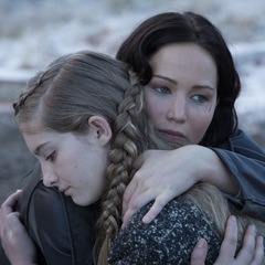 katniss and prim - hunger games catching fire - braids - hair - hug