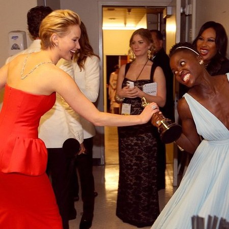 jennifer lawrence - lupita nyongo - best supporting actress at the oscars 2014 - fighting over award - handbag.com
