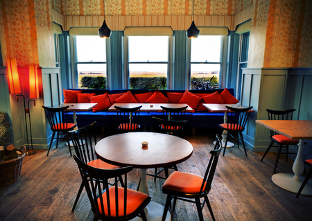 Titchwell Manor hotel review - Norfolk hotel review - travel hotel reviews - where to stay in Norfolk - travel ideas - dining - conservatory - handbag.com