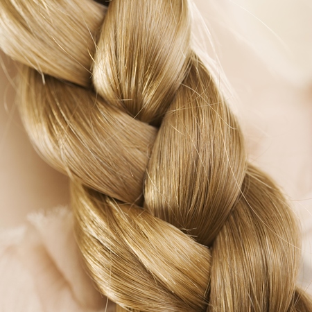 plait hairstyle - blonde hair plait close up - handbag.com