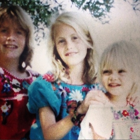 Cara and Poppy Delevingne - awkward childhood photos - stylish celebrities - baby feature - baby news - handbag.com