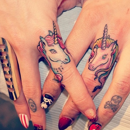 Cara Delevingne starts finger tattoo trend - unicorn tattoo - new tattoo trend - fashion news - day bag - handbag.com